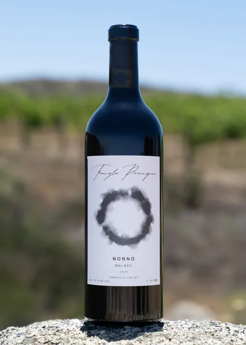Famiglia Principini Nonno — dark ink enso circle label, Malbec Temecula Valley 2024